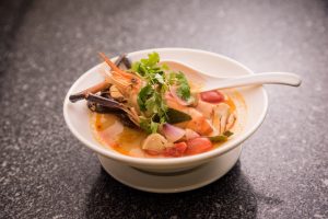 Spicy prawn soup with lemongrass, kaffir lime and straw mushrooms