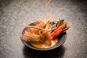 River prawn in red curry with coconut milk