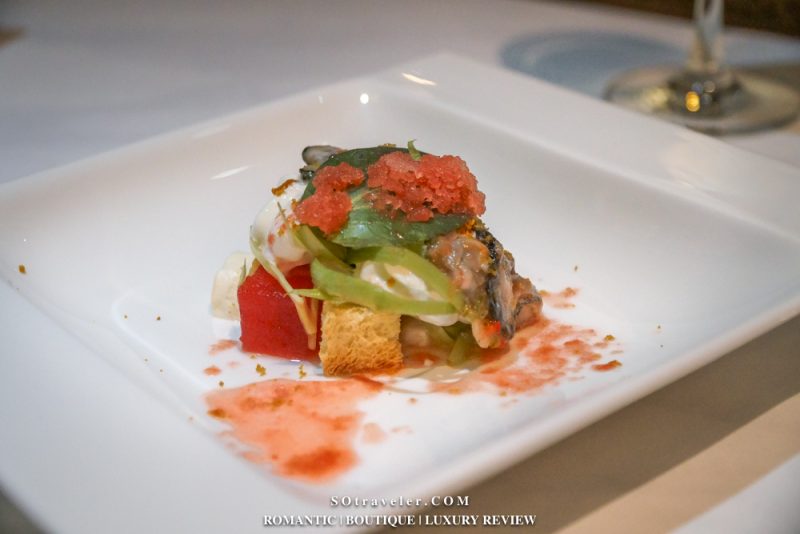 a starter of marinated watermelon with Italian burrata cheese, oysters and asparagus salad.