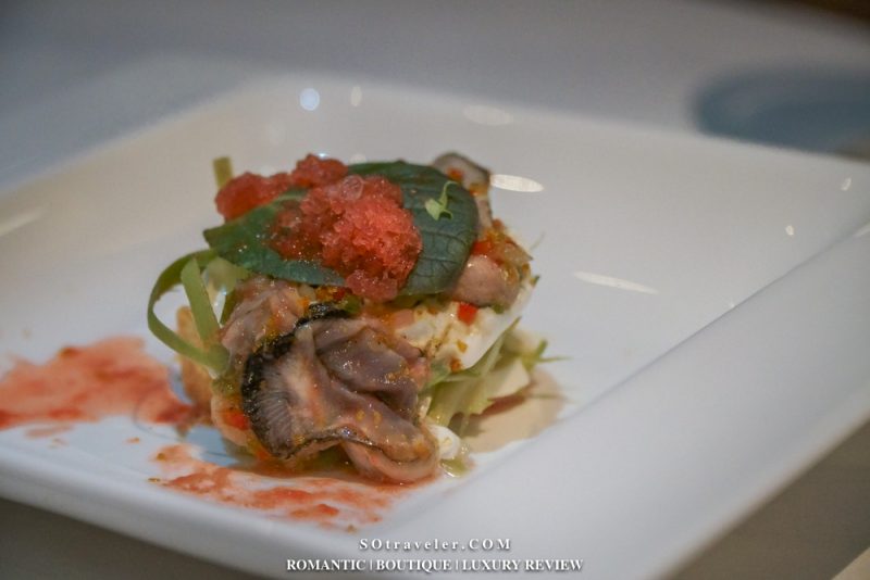 a starter of marinated watermelon with Italian burrata cheese, oysters and asparagus salad.